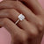 PRINCESS CUT MOISSANITE PAVÉ SET SHOULDERS WITH HIDDEN HALO