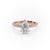 PEAR CUT MOISSANITE PAVÉ SET SHOULDERS WITH HIDDEN HALO