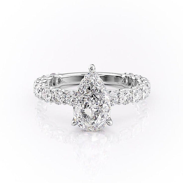 PEAR CUT MOISSANITE STONE SET SHOULDERS WITH HIDDEN HALO