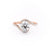 Round Cut Moissanite Twist Ring