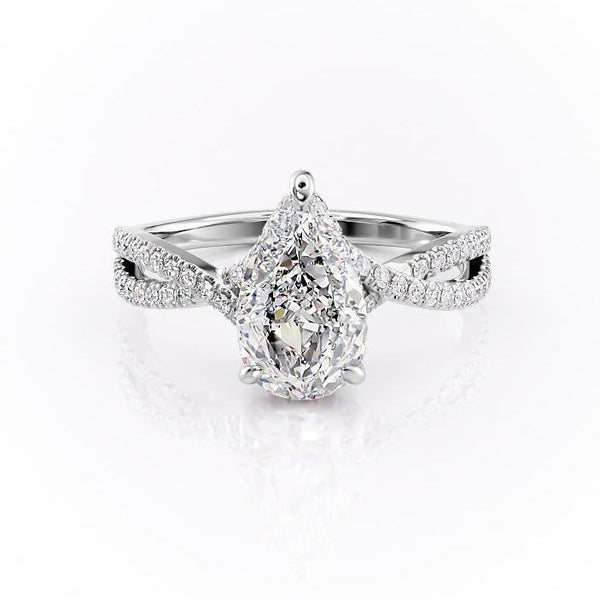 Pear Cut Moissanite Ring With Twisted Stone Set Shoulders