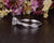 Round Cut Moissanite Engagement Ring, Vintage Twist Design